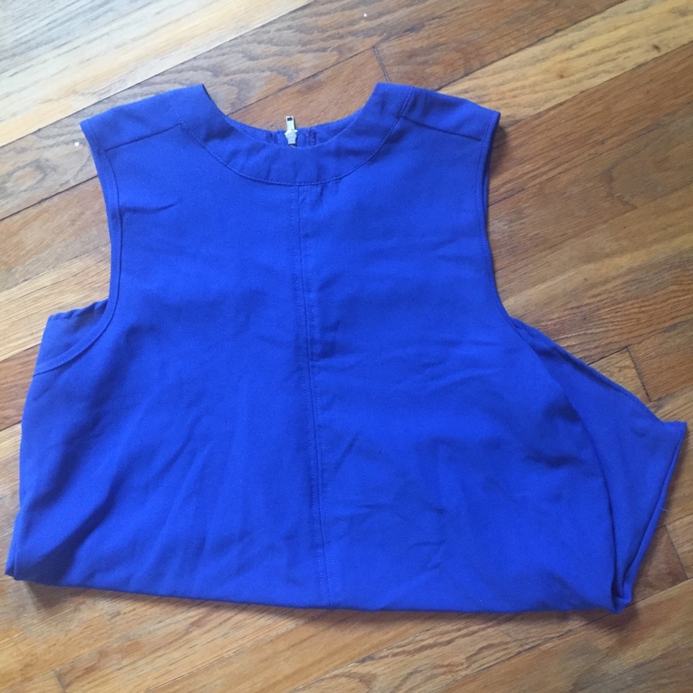 blue sleeveless blouse